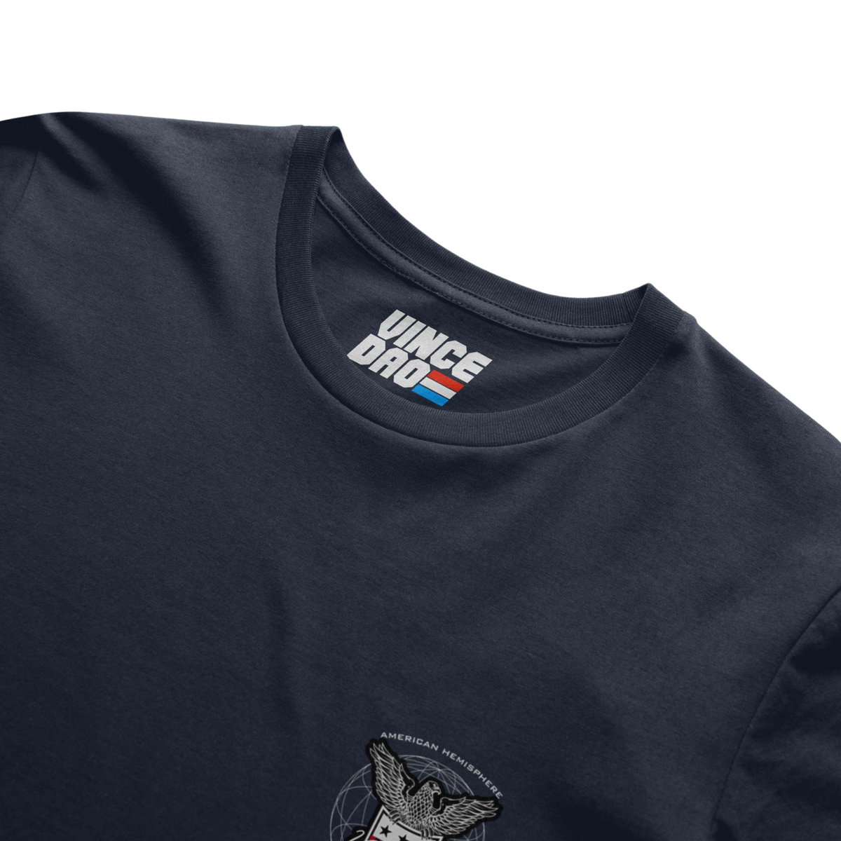 Navy t-shirt shown at an angle, showing the shoulder and chest emblem